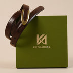 Darci brown belt resting on the olive Kieth Amora gift box