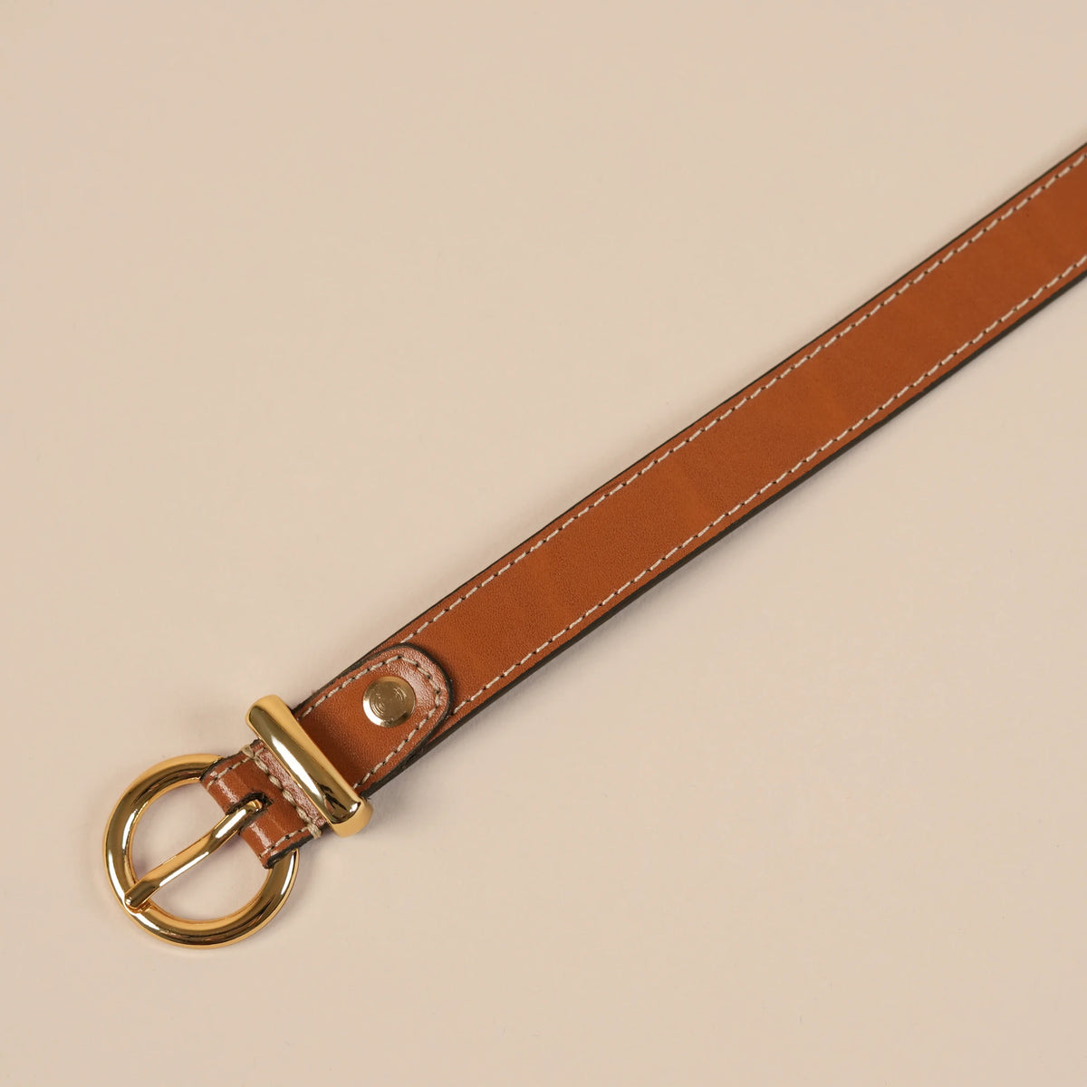 Georgia tan belt tip and gold buckle
