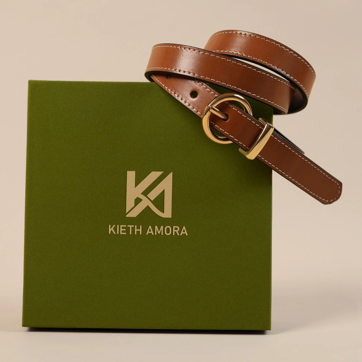 Georgia belt resting on the olive Kieth Amora gift box