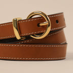 Close-up of contrast edge stitching on the tan Georgia belt