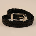 Close-up of the Rio belt's black braided weave and silver buckle