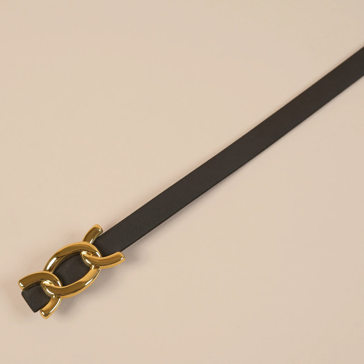 Scarlett black belt tip and gold chain-link buckle