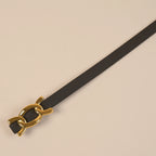 Scarlett black belt tip and gold chain-link buckle