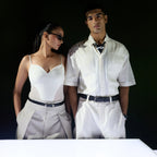 Couple in white outfits, man wearing the black Croco belt