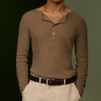 Man in a brown henley and beige trousers wearing the brown Croco belt