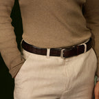 Brown Croco belt worn with a brown sweater and beige trousers