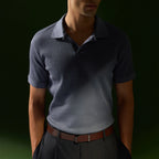 Man in a blue polo and dark trousers wearing the Brown Kensington belt